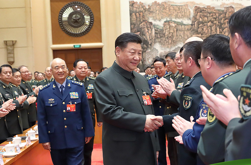 强军征途丨习近平与退役军人的温暖瞬间