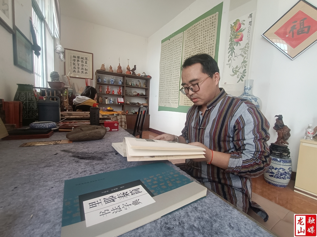 以笔墨助力秦简文化推广