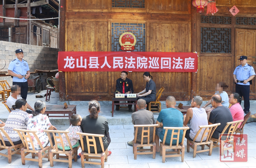 “大山是我最广阔的舞台”——记全国模范法官、龙山县人民法院副院长田代飞